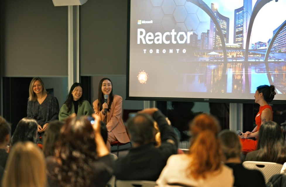 Maggi moderating a panel at Microsoft Reactor Toronto
